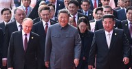 Putin grins with Kim and Xi Jinping as 'axis of evil' meet up at military parade