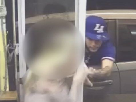 Video shows man trying to snatch bikini barista from coffee shop