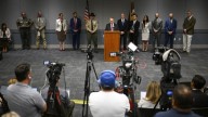 As officials searched for Charlie Kirk’s shooter, suspect confessed to his partner, prosecutor says