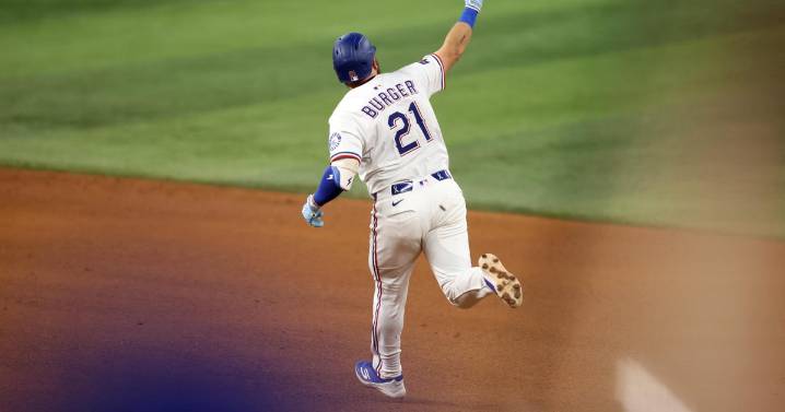 Burger homers twice in Rangers' 6