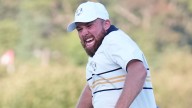 Shane Lowry holes putt to silence hecklers as Europe survive epic USA singles fightback to retain Ryder Cup