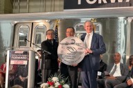 Workers who build NYC's subway cars face low pay, anti-union bosses, report alleges