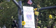 Protestors rally in downtown Knoxville to oppose deployment of National Guard to Memphis
