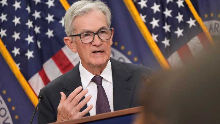 Powell signals Federal Reserve to move slowly on interest rate cuts