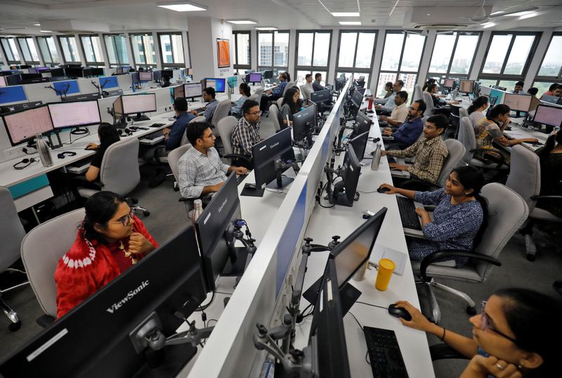 India's strong private sector expansion loses some steam in September, PMIs show