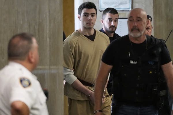 Judge tosses terrorism charges against Luigi Mangione