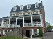 Two Syracuse University students charged with hate crimes after attack on fraternity, police say