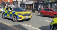 Shops 'closed' and police 'everywhere' as gunman fears put schools in lockdown