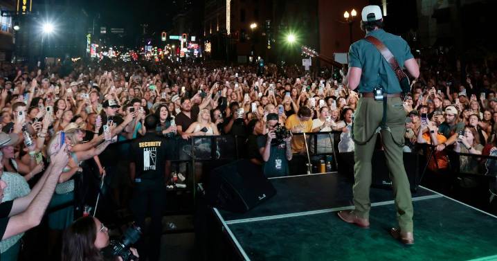 Country music fan pulled up stage by star and can't believe what happens next