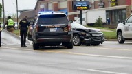 'Reckless driving and rain don't mix' | Kent Co. Sheriff's Deputy cruiser struck on Alpine Ave.