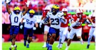 Michigan breaks away for Big Ten win