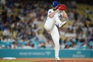 Dodgers' no-hit bid falls short in 9th but rally for 3-1 win over Rockies