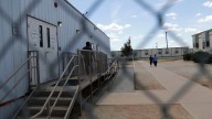 Bottled water sold for $1.21, dismissed medical pleas and faith tested at family detention facility