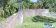 Encampments along floodwall affect maintenance