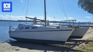 Search underway for two men aboard catamaran Mangrove Jack missing off northern NSW