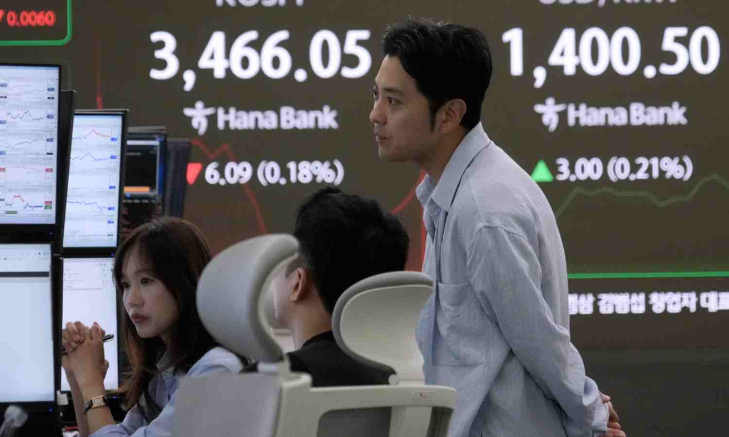Asian shares tumble after Trump says he will impose new tariffs on drugs, other goods