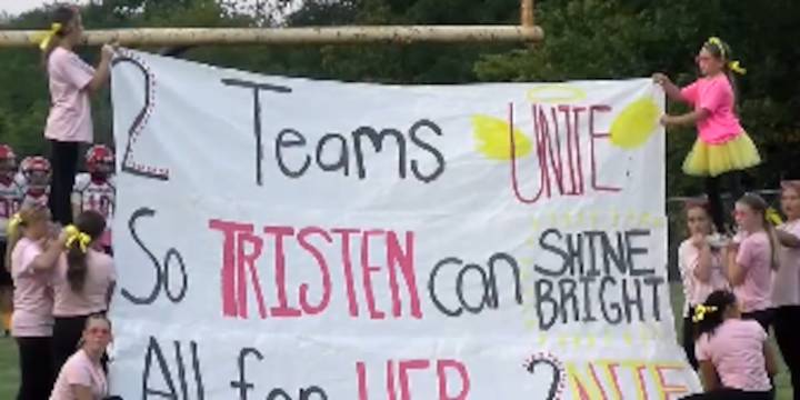 Rival football teams unite to honor slain 15
