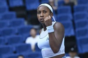 Gauff survives tense Bencic test to reach Beijing quarter