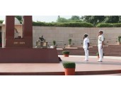Kenya's Navy Commander Major General Paul Owuor Otieno pays tributes at the National War Memorial