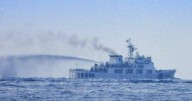 China fires water cannon at Philippine ships near shoal