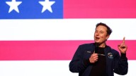Musk buys $1B in Tesla stock as board pitches new compensation plan
