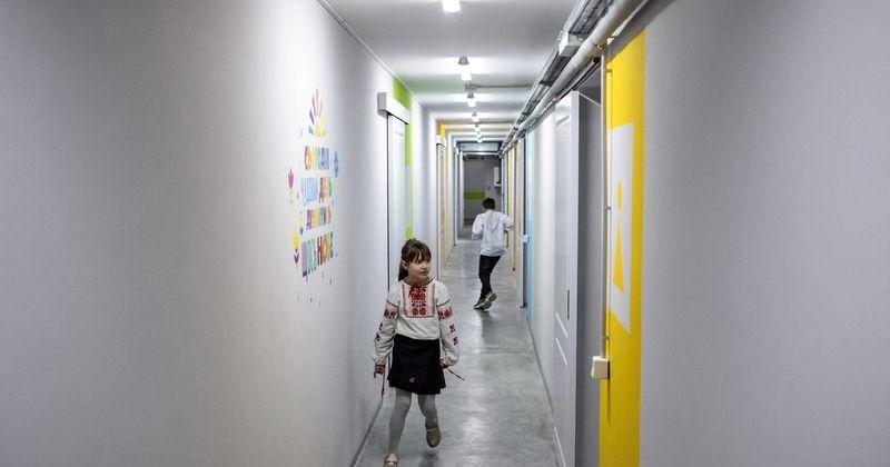 Ukrainian children open school year by heading underground