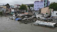Families Return As Musi River Water Recedes In Hyderabad’s Flood