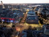 Tens of thousands march in Serbia's capital, demand snap vote