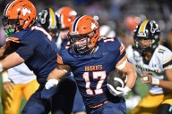 Football: William Eloe, Naperville North run over Metea