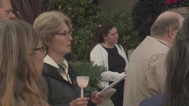 Nashua community honors shooting victims at candlelight vigil outside city hall