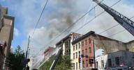 Fire that spread across three vacant buildings in Downtown Baltimore contained