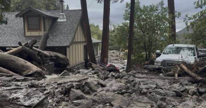Mudslides trap drivers, bury roads and damage homes in southern California