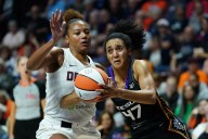 Deadspin | Rhyne Howard, Dream pull away late to defeat Sun