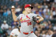 Deadspin | After tweak sparks win, Reds continue playoff push vs. Cardinals