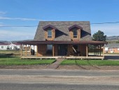 Suspect at large after crashing into Rich County home