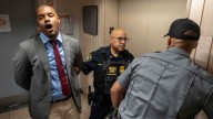 Elected officials and dozens of protesters are arrested at Manhattan immigration holding facility