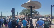 Garland unveils giant cowboy hat sculpture, celebrates Texas roots