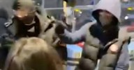 Dad watches in horror as a masked thugs surround his wife over FaceTime