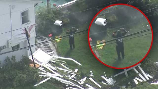 Armored vehicles, numerous federal agents make dramatic arrest