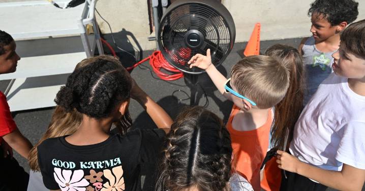 Schools stock up on fans to sweat out 101 degree first day of school with no air conditioning