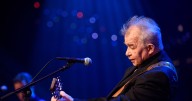 Author changes approach to John Prine book after musician’s death