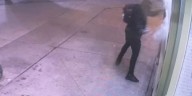 Caught on video: vandal smashes front window at Watertown barbershop