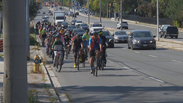 Scarborough cyclists call on city for safer road conditions amid delayed improvement project