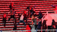 Argentina sanciona a hinchas chilenos tras brutal violencia en un partido de fútbol
