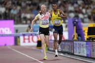 A shoulder to lean on: Steeplechaser stops, lends a helping hand to a struggling competitor