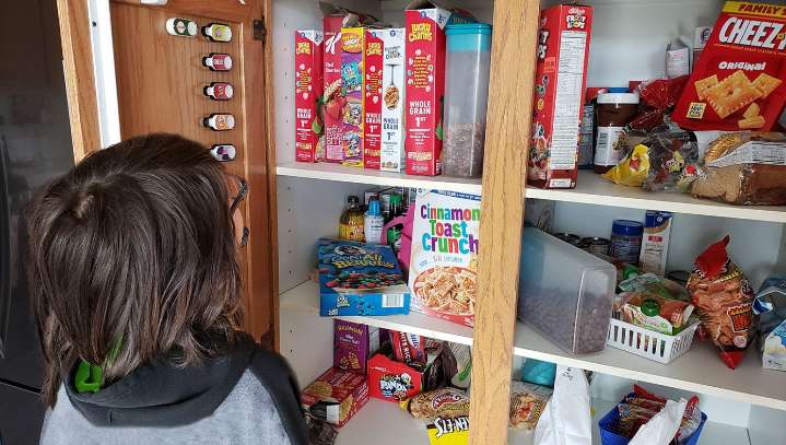 Kid Staring At 47 Varieties Of Cereal Declares There's Nothing To Eat