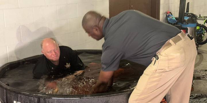 45 inmates get baptized at Thomas County Jail
