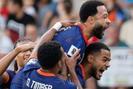 Depay is Netherlands' all-time top scorer with 52 goals, Germany gets first win in WCup qualifying