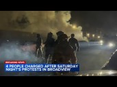4 protesters charged after clash outside Illinois ICE facility