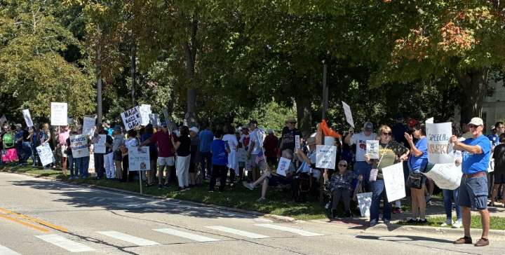 Hundreds rally in support of labor, in protest of Trump